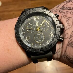 Black Chronograph Watch with Yellow Accents